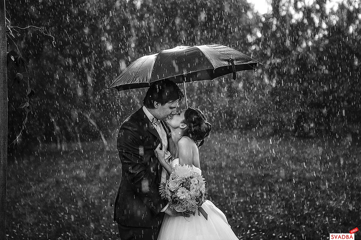 Фотограф под дождем