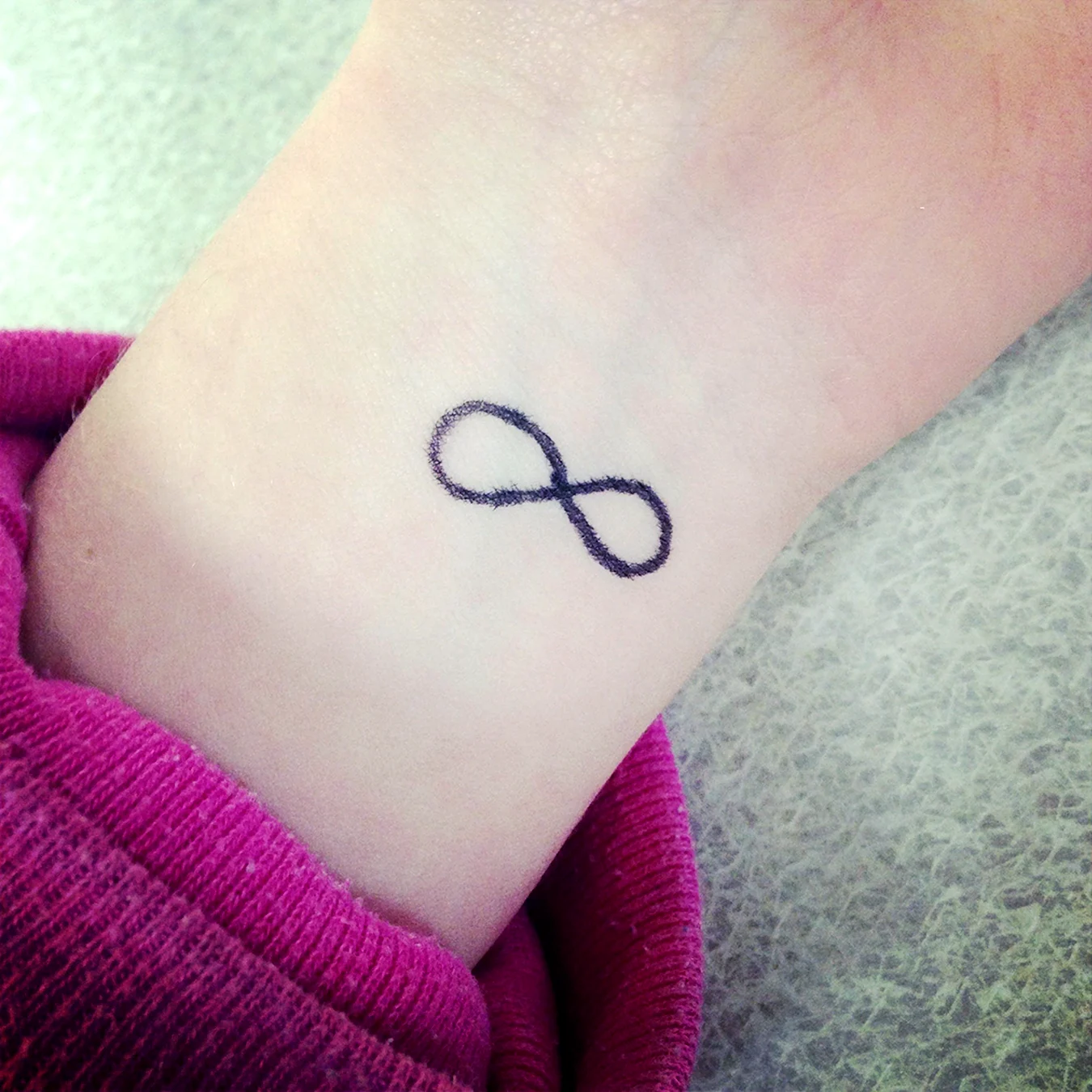 Infinity symbol Tattoo