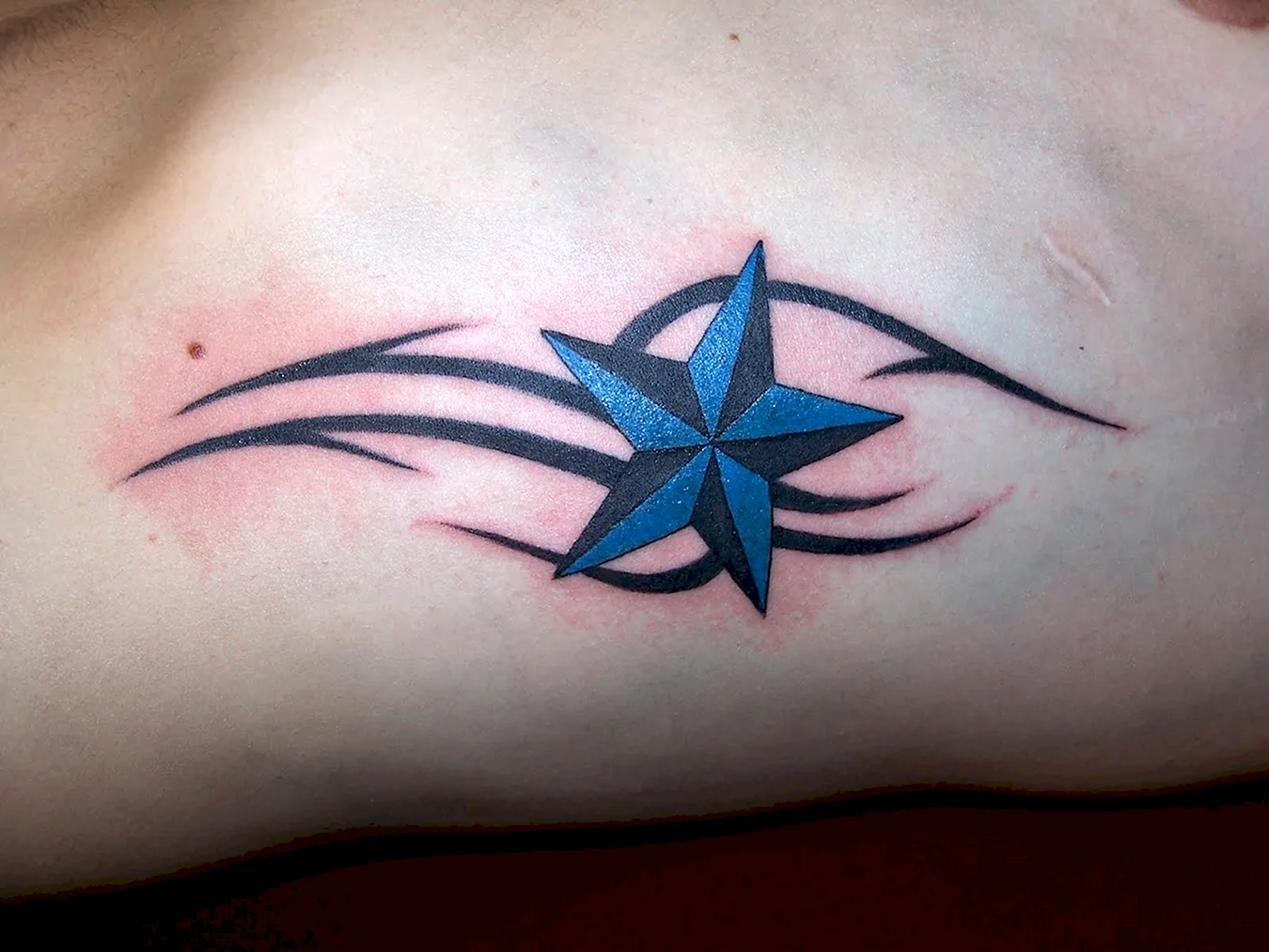 Татуировка четырехконечная звезда