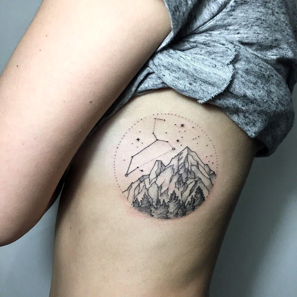 Татуировка горы в круге