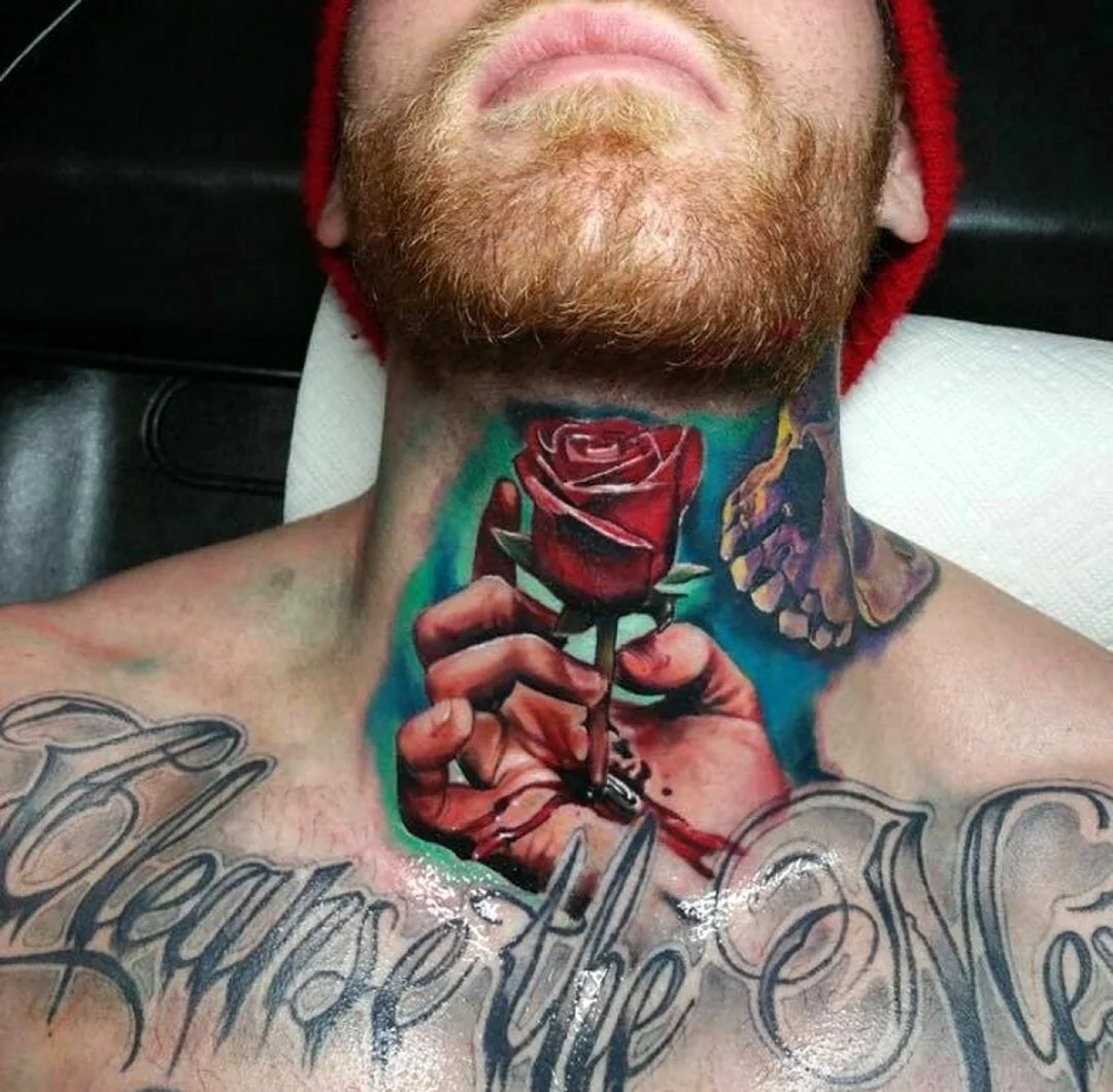 Татуировки на горле у мужчин