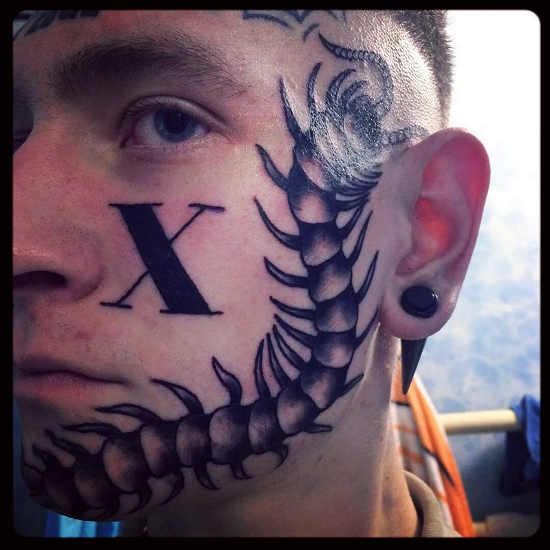Татуировки сколопендра с лицом